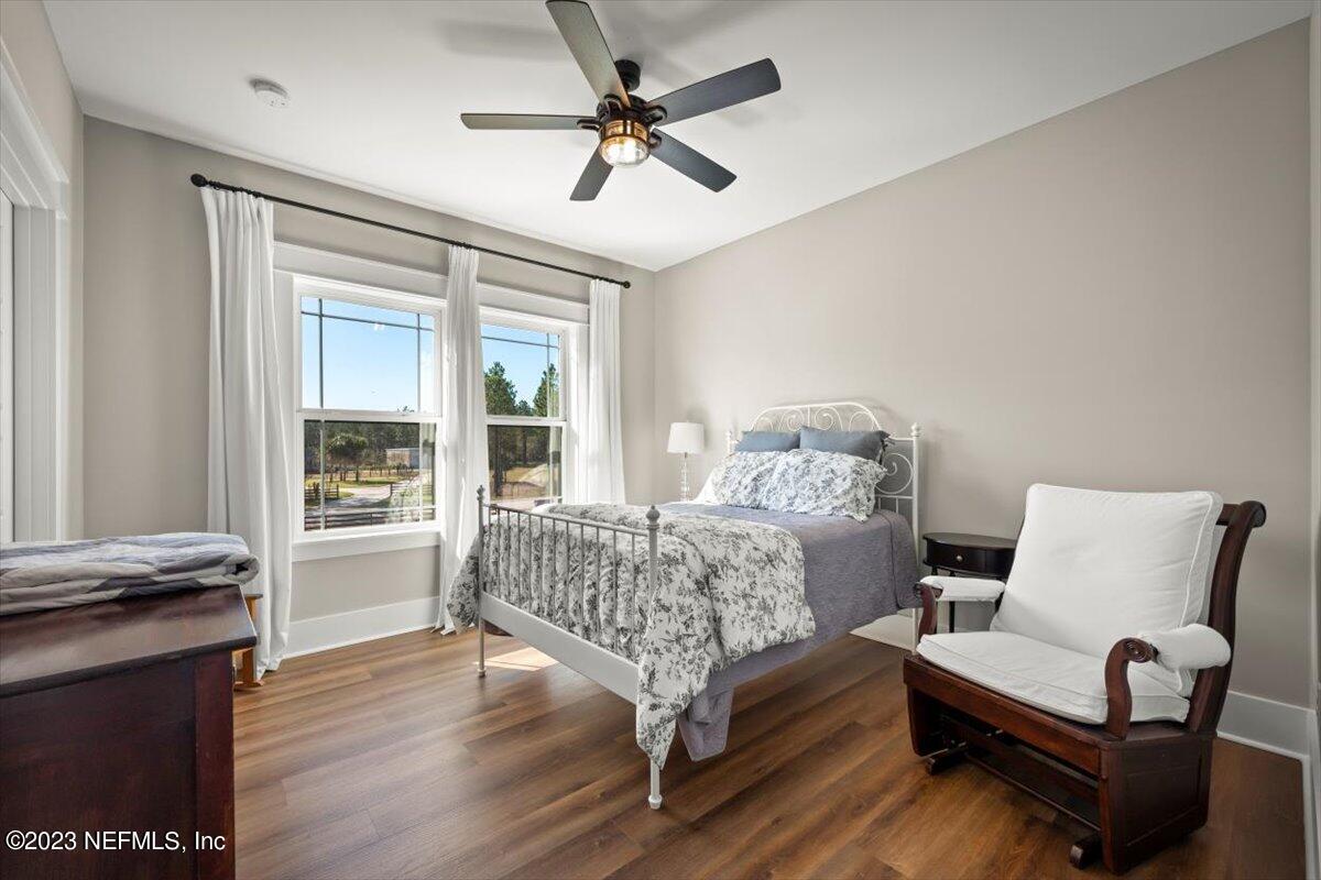 3200 Jane Lane Hilliard, FL 32046 - Photo 34 of 72 a living room with furniture and a window