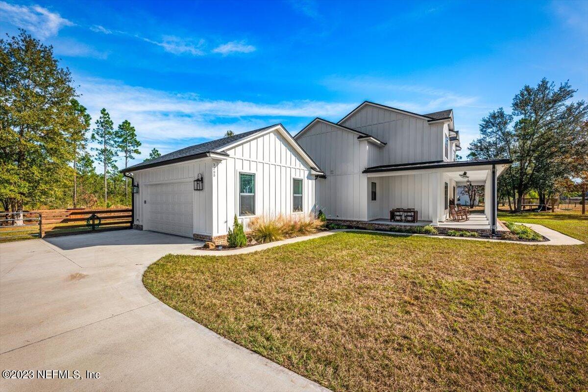 3200 Jane Lane Hilliard, FL 32046 - Photo 39 of 72 a view of a house with swimming pool and sitting area