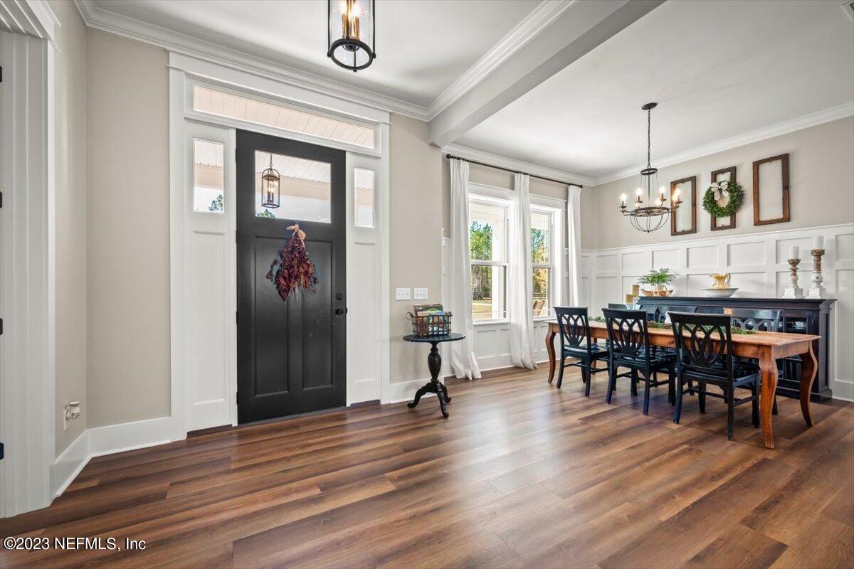 3200 Jane Lane Hilliard, FL 32046 - Photo 3 of 72 a view of a dining room with furniture window and wooden floor