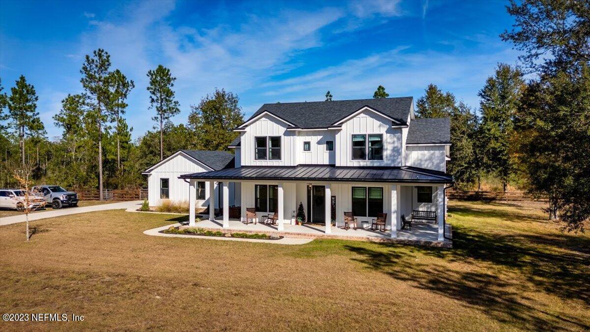 3200 Jane Lane Hilliard, FL 32046 - Photo 48 of 72 a front view of a house with a yard