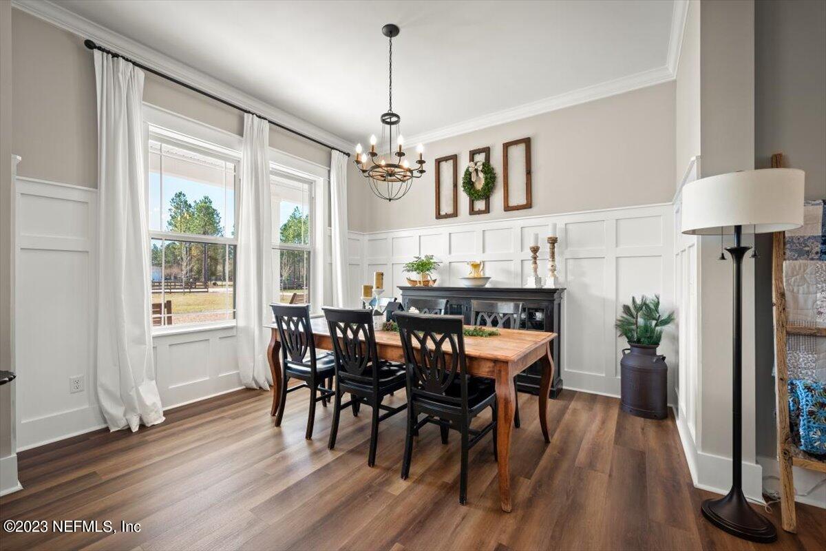 3200 Jane Lane Hilliard, FL 32046 - Photo 4 of 72 a view of a dining room with furniture window and wooden floor