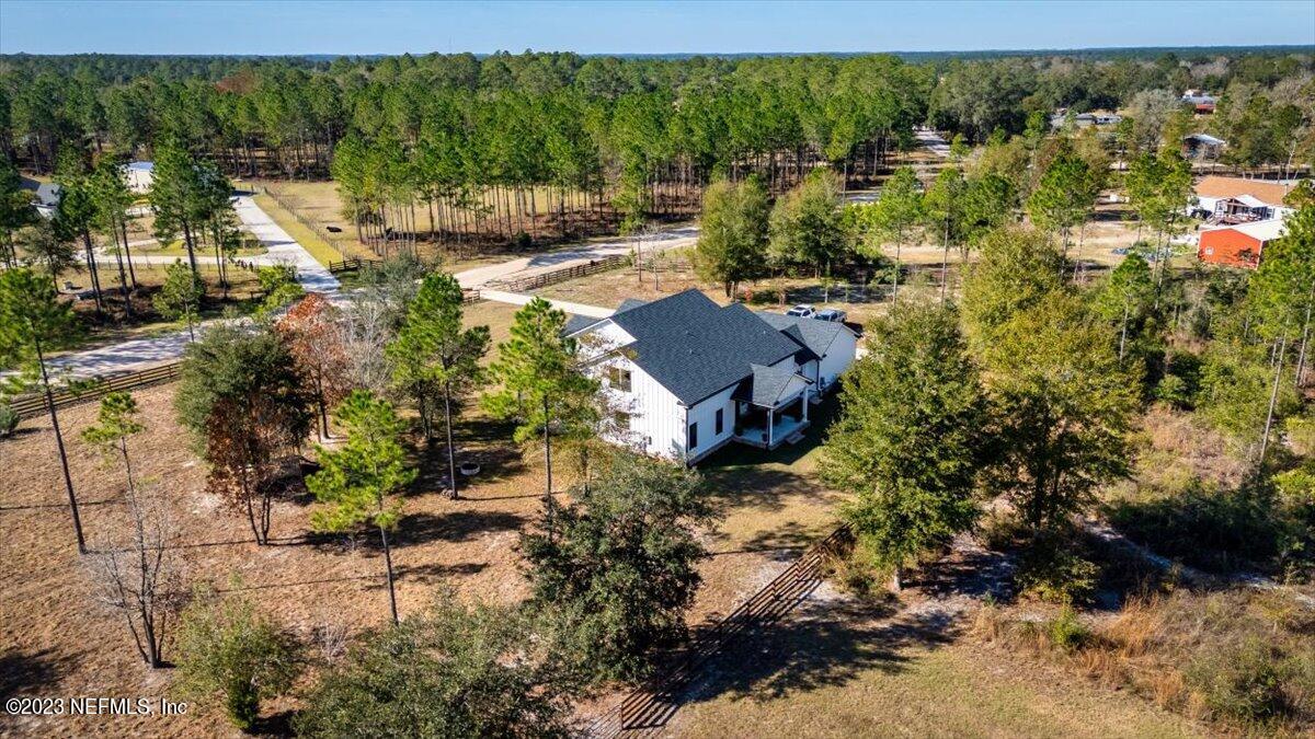 3200 Jane Lane Hilliard, FL 32046 - Photo 52 of 72 a view of a house with a yard