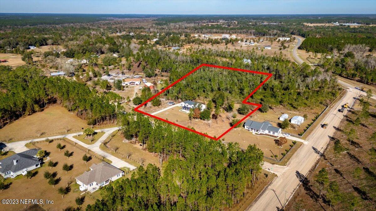 3200 Jane Lane Hilliard, FL 32046 - Photo 57 of 72 an aerial view of residential houses with outdoor space