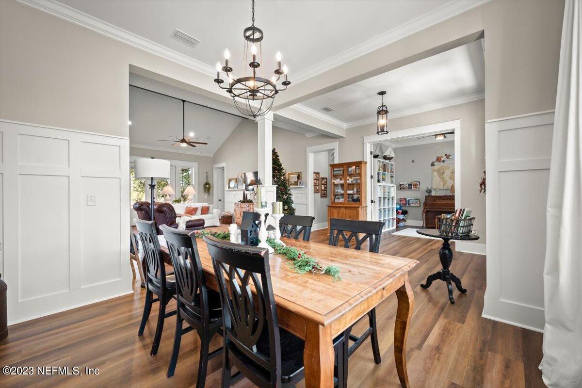 3200 Jane Lane Hilliard, FL 32046 - Photo 5 of 72 a view of a dining room with furniture and wooden floor