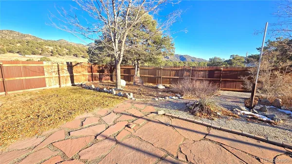 a view of a backyard of a house