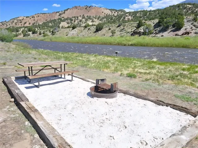 a view of a lake with a mountain