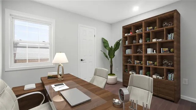 a living room with furniture a lamp and a window