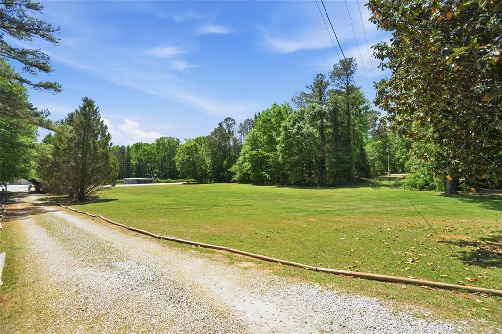 5737 Highway 20 Covington, GA 30016 - Photo 2 of 22 a view of a tennis court