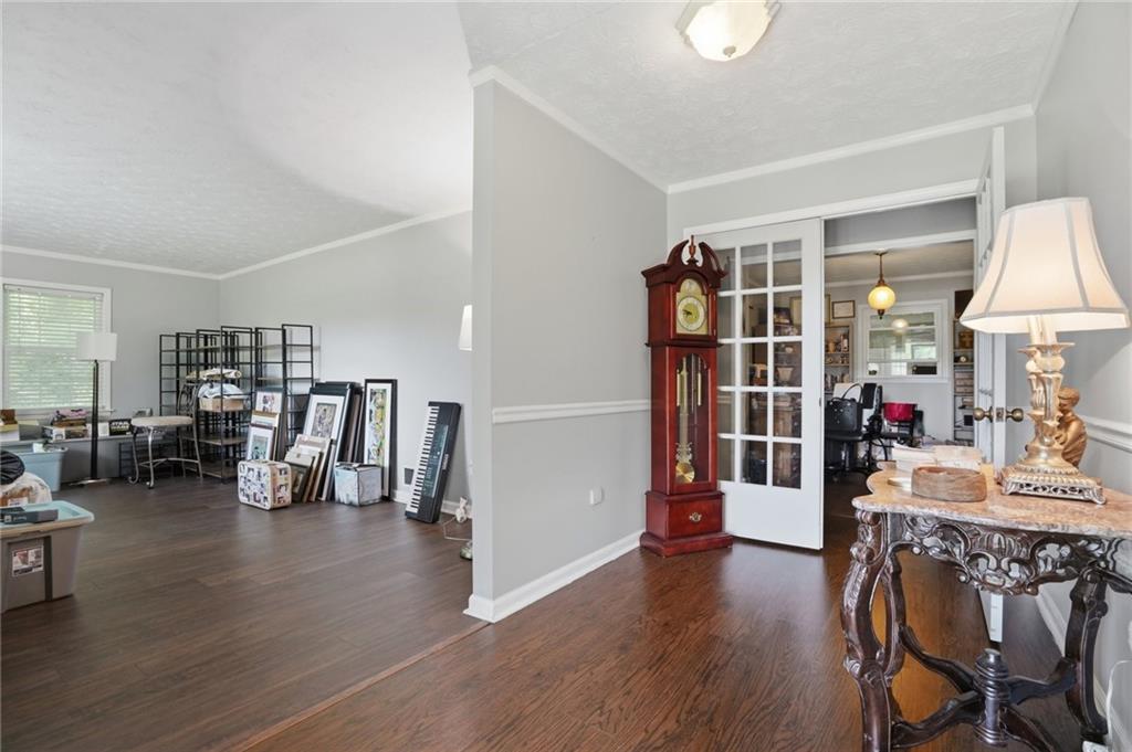 5737 Highway 20 Covington, GA 30016 - Photo 4 of 22 a view of livingroom with furniture and wooden floor