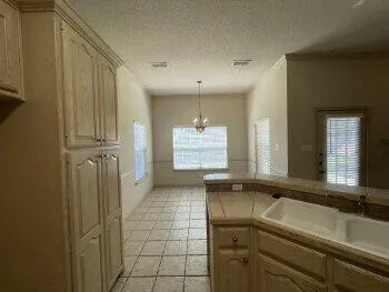 a bathroom with a sink a mirror and a bathtub