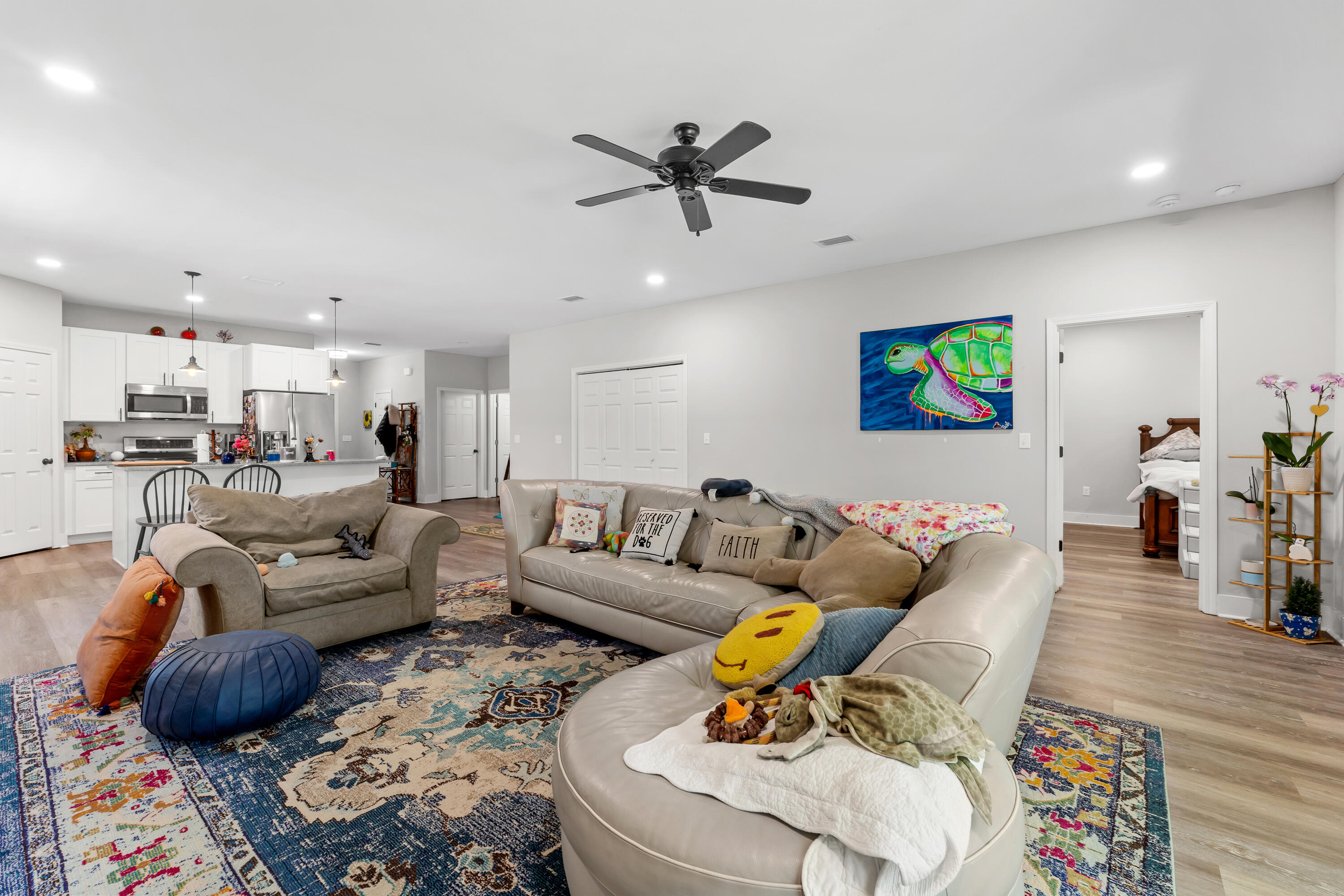 191 Indian Woman Road Santa Rosa Beach, FL 32459 - Photo 11 of 29 a living room with furniture and a wooden floor