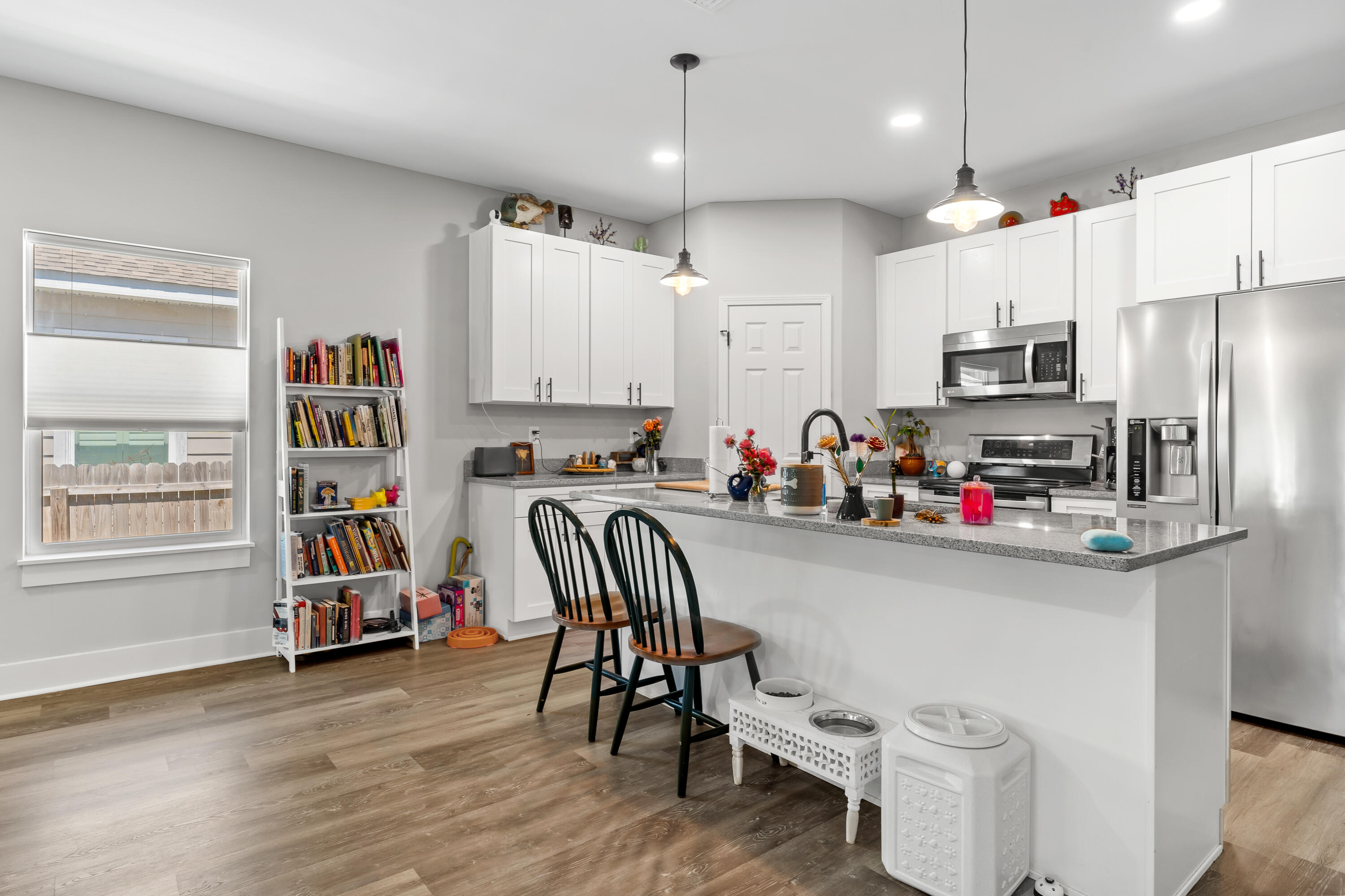 191 Indian Woman Road Santa Rosa Beach, FL 32459 - Photo 13 of 29 a kitchen that has a lot of cabinets and appliances