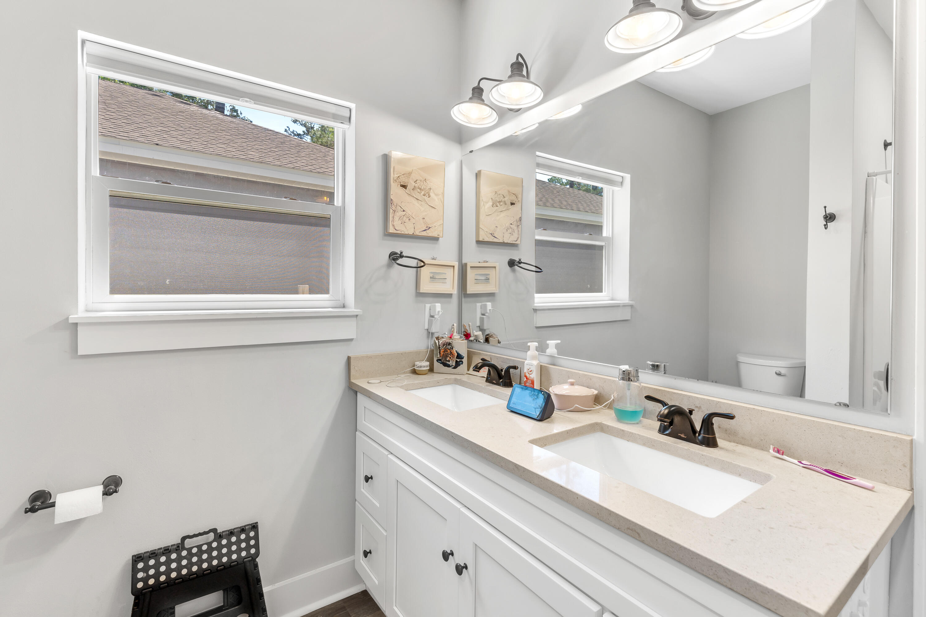 191 Indian Woman Road Santa Rosa Beach, FL 32459 - Photo 21 of 29 a bathroom with a sink vanity and a mirror