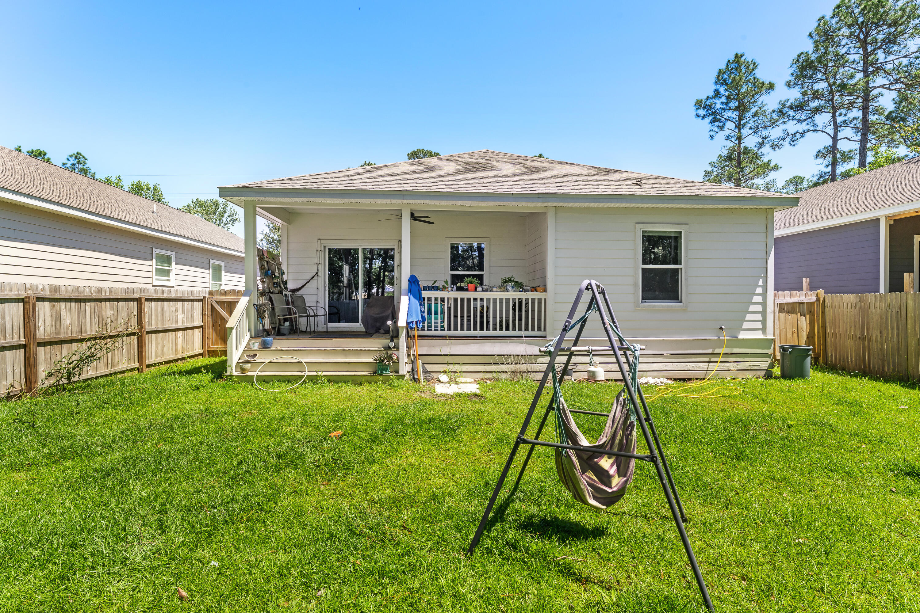 191 Indian Woman Road Santa Rosa Beach, FL 32459 - Photo 28 of 29 a house view with a backyard space