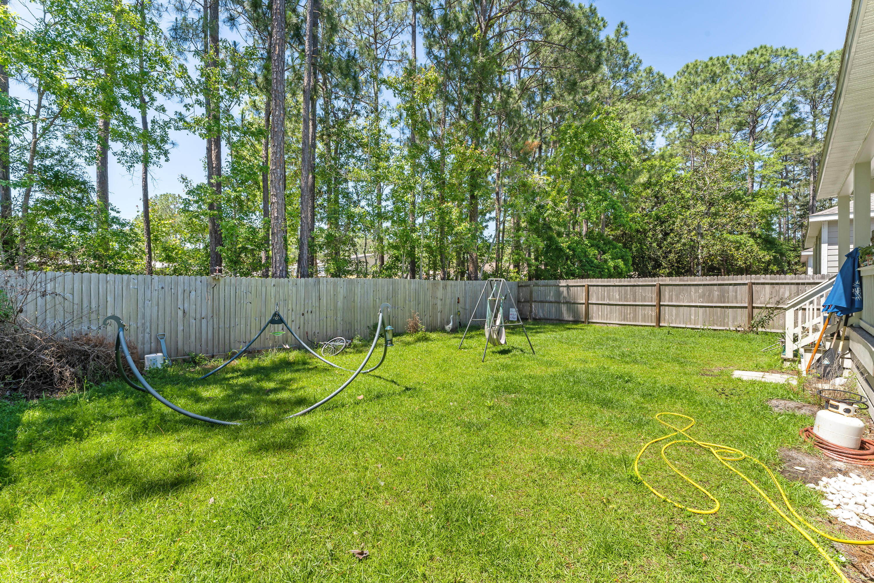 191 Indian Woman Road Santa Rosa Beach, FL 32459 - Photo 29 of 29 a garden with wooden fence