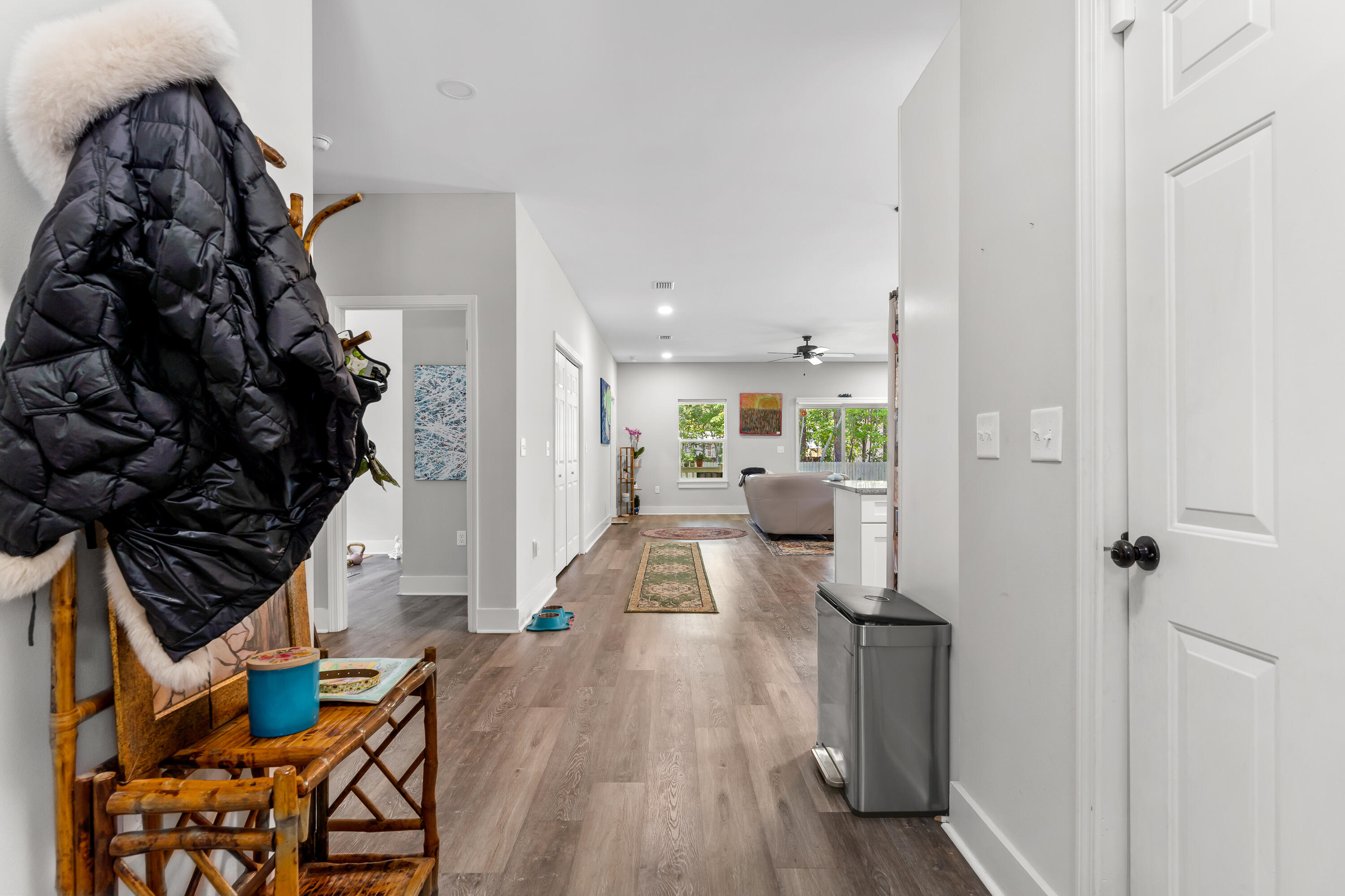 191 Indian Woman Road Santa Rosa Beach, FL 32459 - Photo 6 of 29 a view of a living room with wooden floor