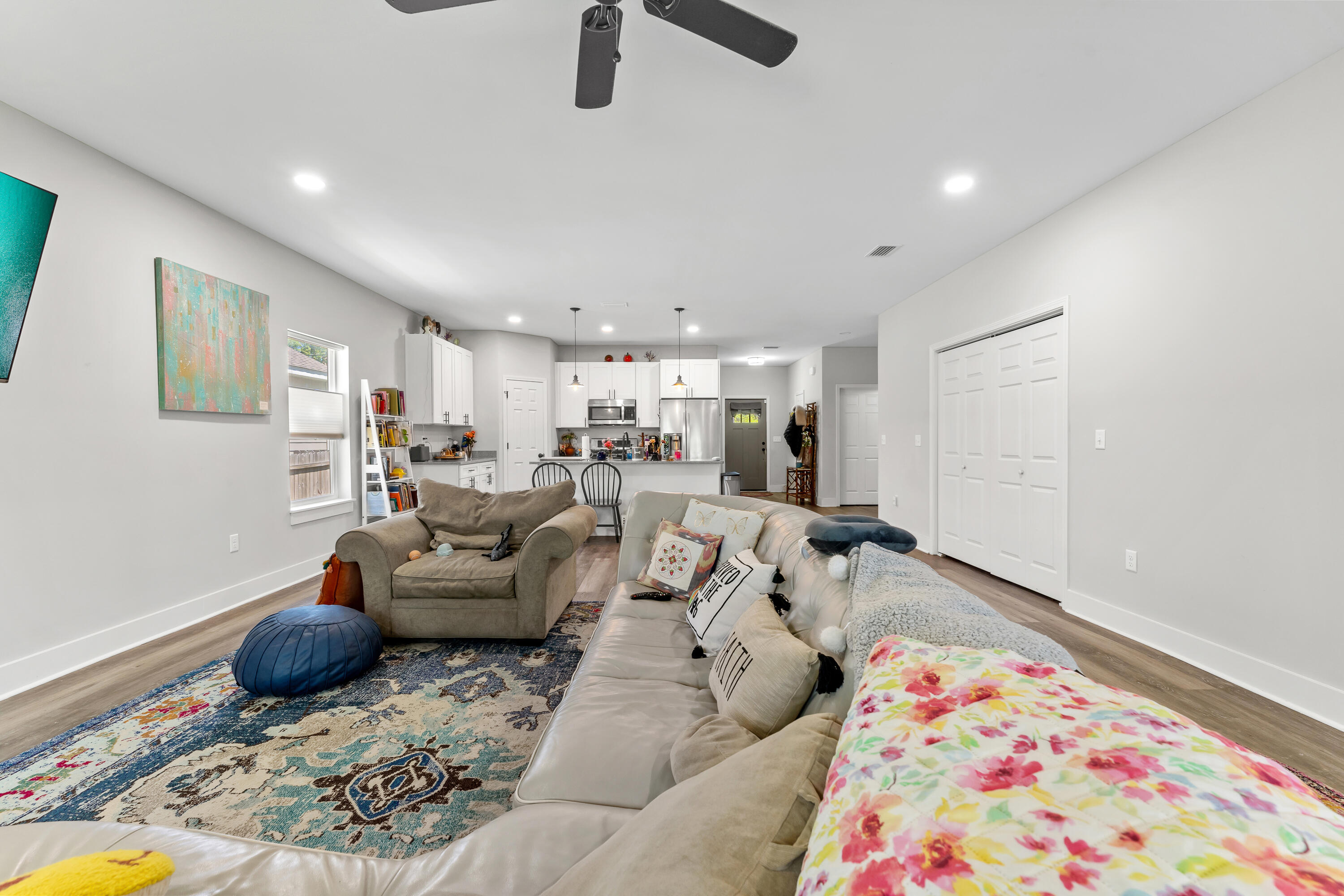 191 Indian Woman Road Santa Rosa Beach, FL 32459 - Photo 10 of 29 a living room with furniture and a rug