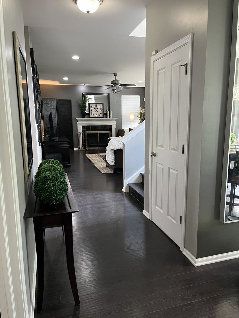 12922 Grande Poplar Circle Plainfield, IL 60585 - Photo 14 of 47 a view of livingroom with furniture and wooden floor