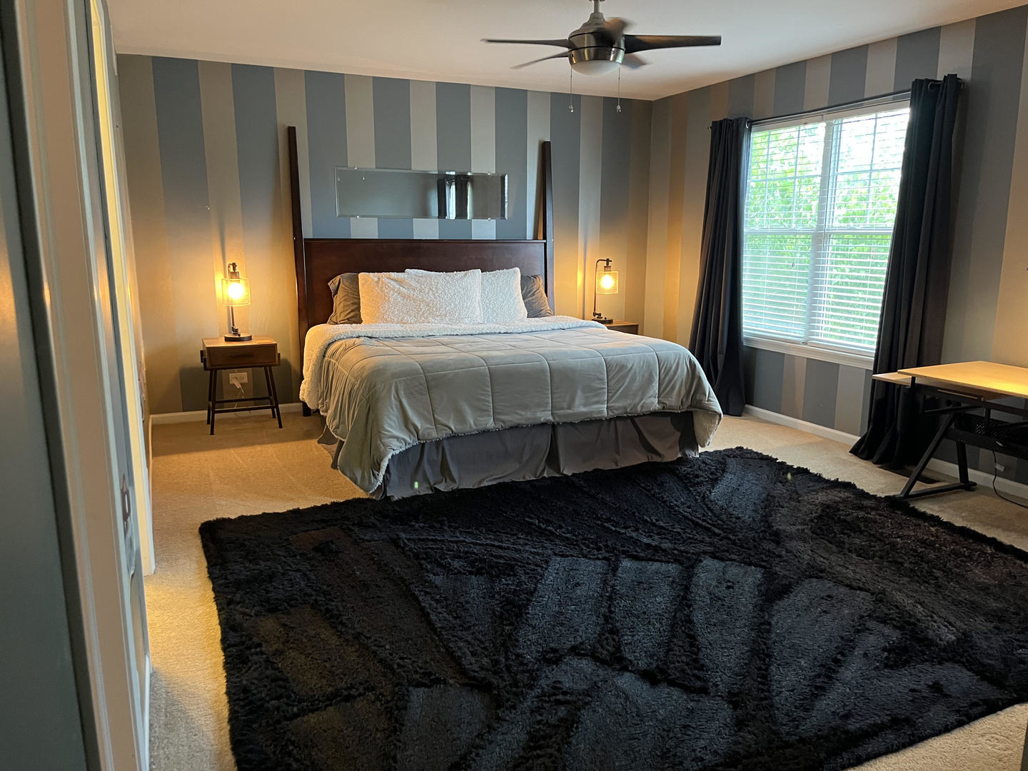 12922 Grande Poplar Circle Plainfield, IL 60585 - Photo 30 of 47 a bedroom with a bed and window