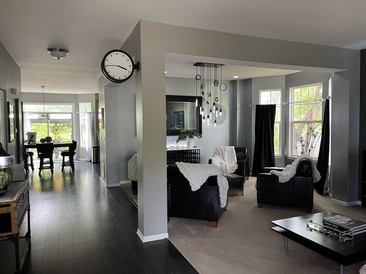 12922 Grande Poplar Circle Plainfield, IL 60585 - Photo 8 of 47 a living room with furniture wooden floor and a large window