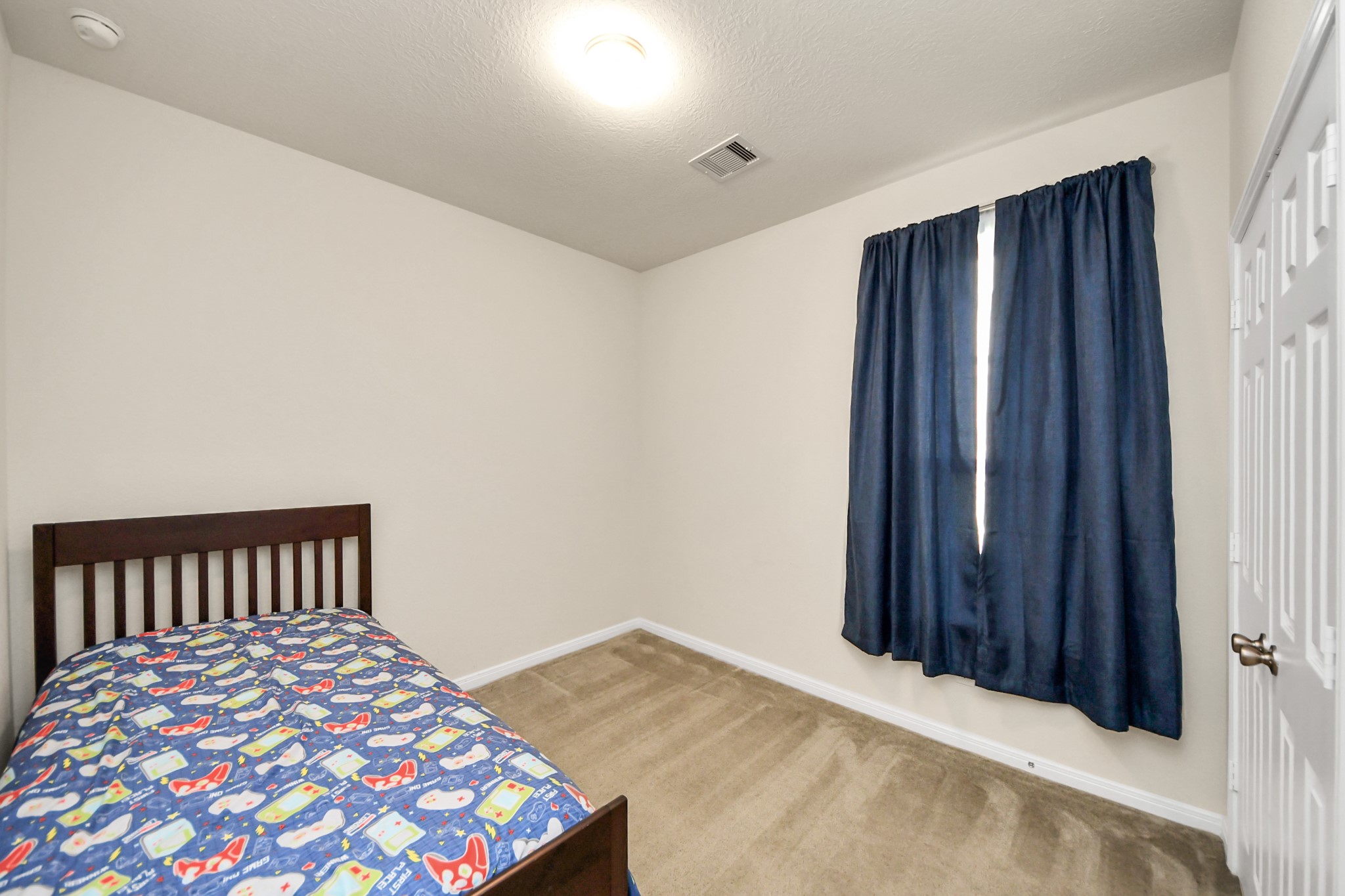 20830 Cullen Ranch Road Katy, TX 77449 - Photo 13 of 20 a bedroom with a bed and wooden floor