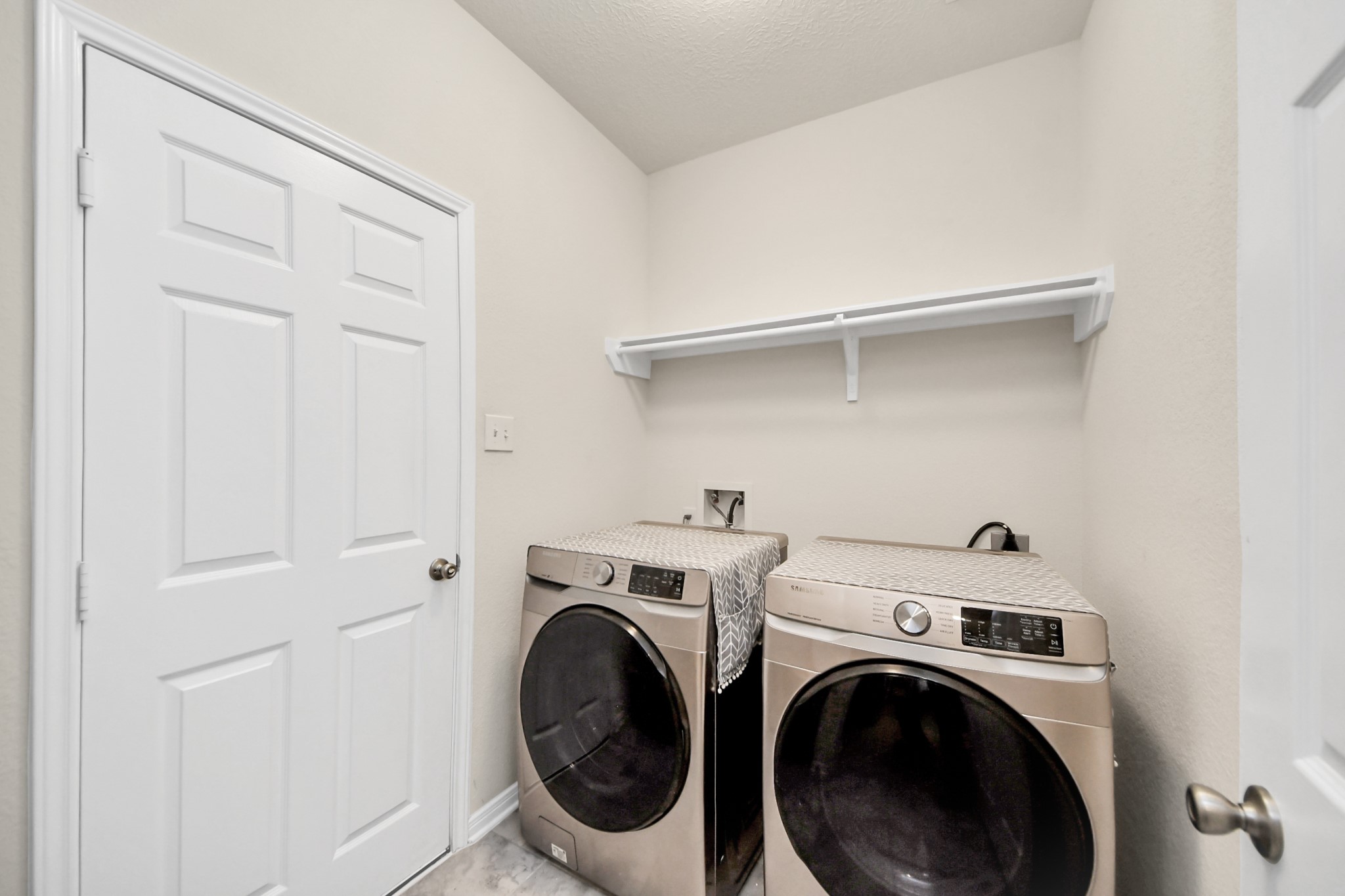20830 Cullen Ranch Road Katy, TX 77449 - Photo 15 of 20 a utility room with dryer and washer
