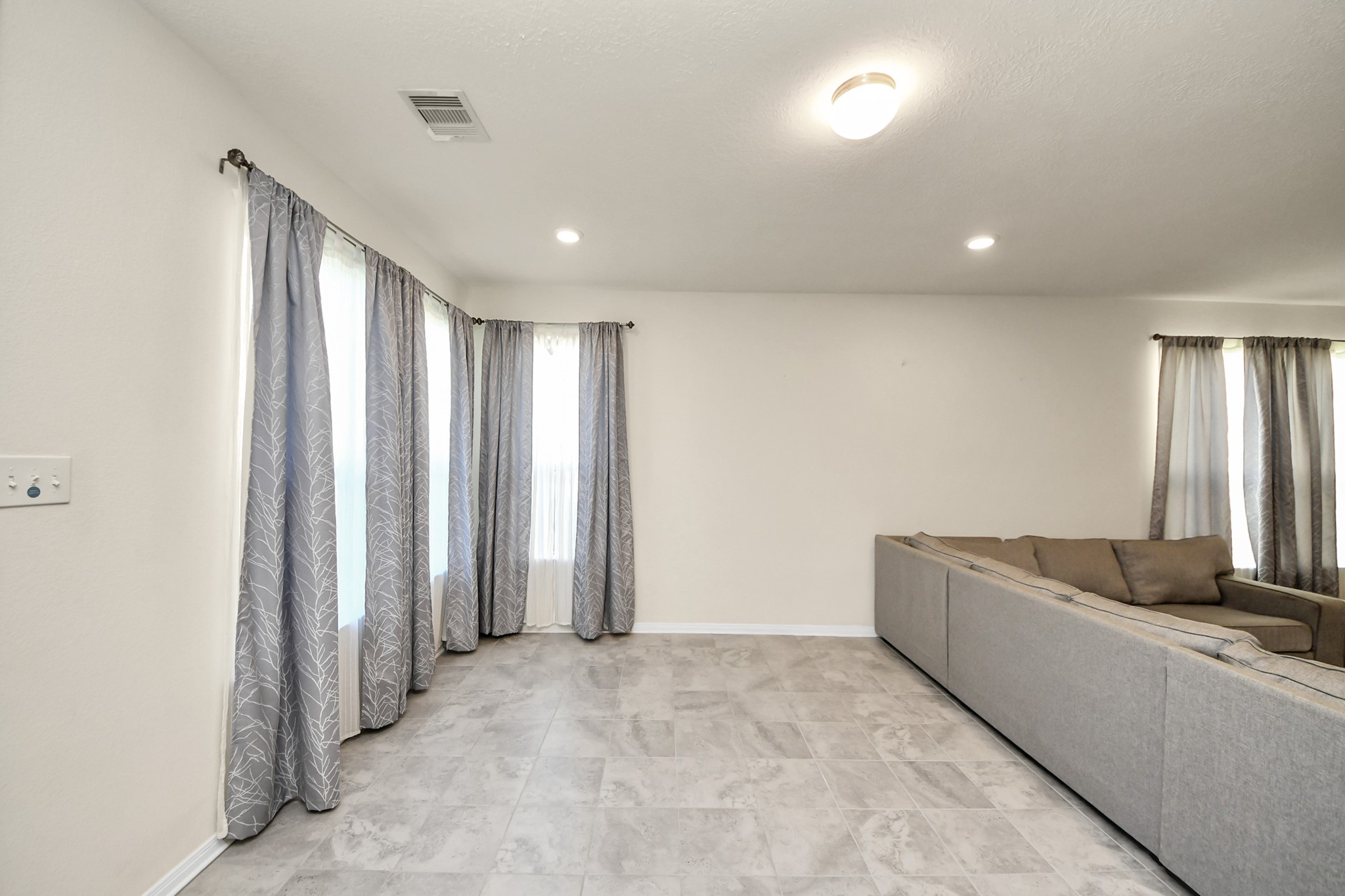 20830 Cullen Ranch Road Katy, TX 77449 - Photo 9 of 20 a view of a livingroom with a staircase