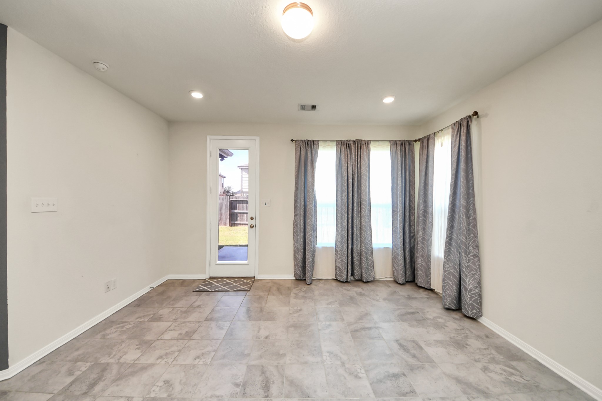 20830 Cullen Ranch Road Katy, TX 77449 - Photo 10 of 20 an empty room with windows and closet