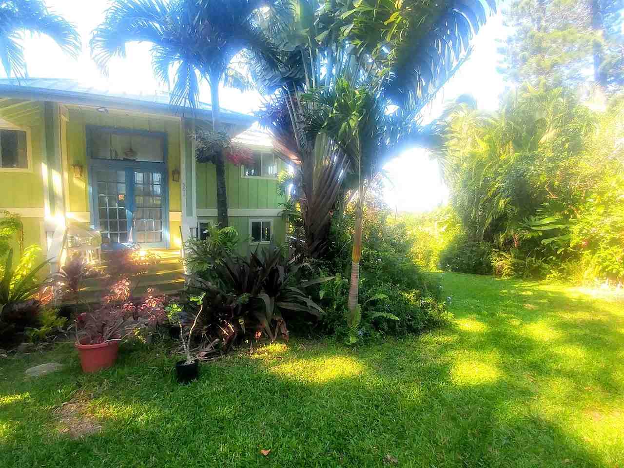 501 Kulike Road Haiku, HI 96708 - Photo 2 of 2 a view of a house with a small yard