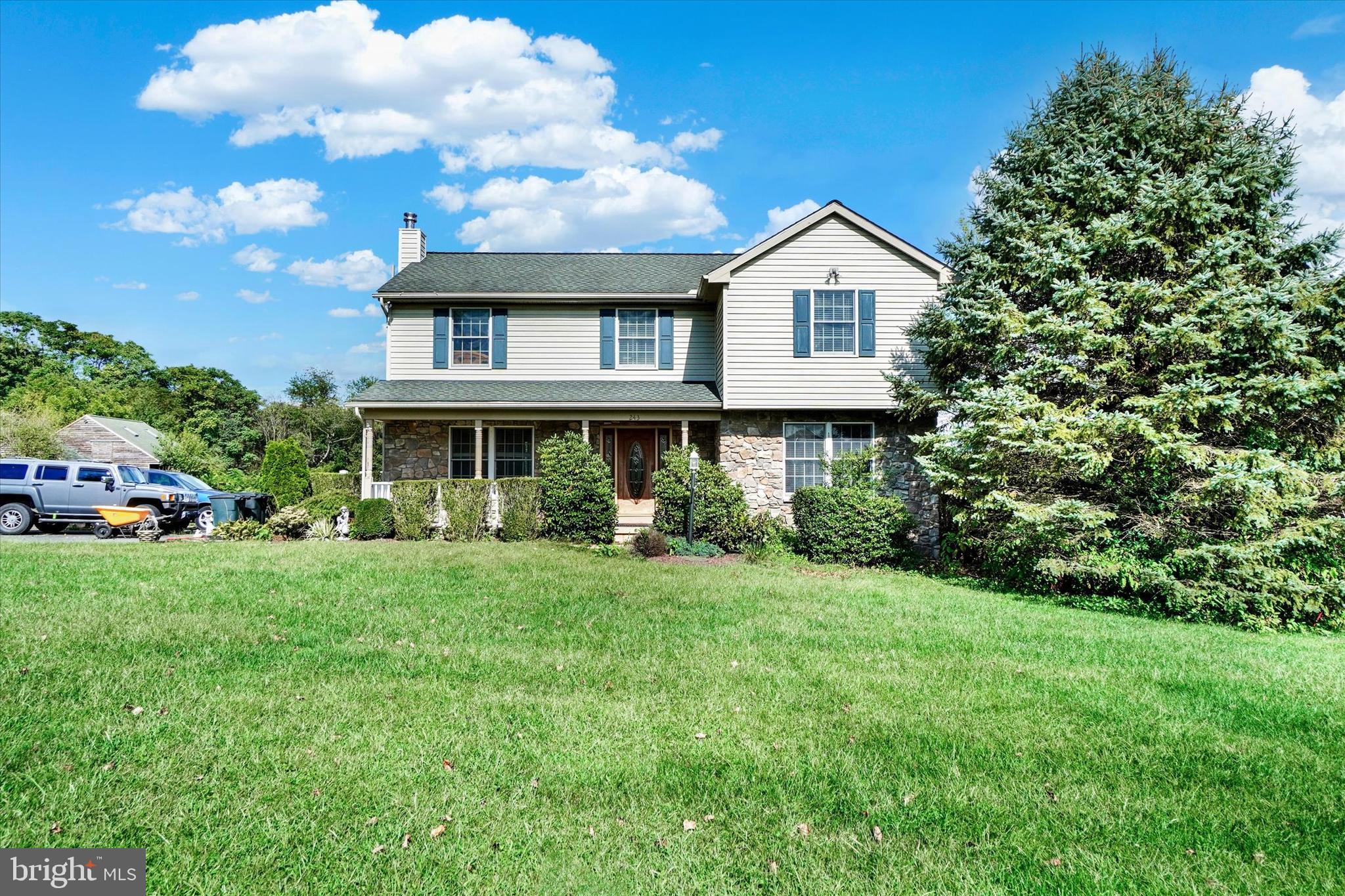 243 Bald Eagle Road Fawn Grove, PA 17321 - Photo 2 of 44 a view of a house with backyard and garden