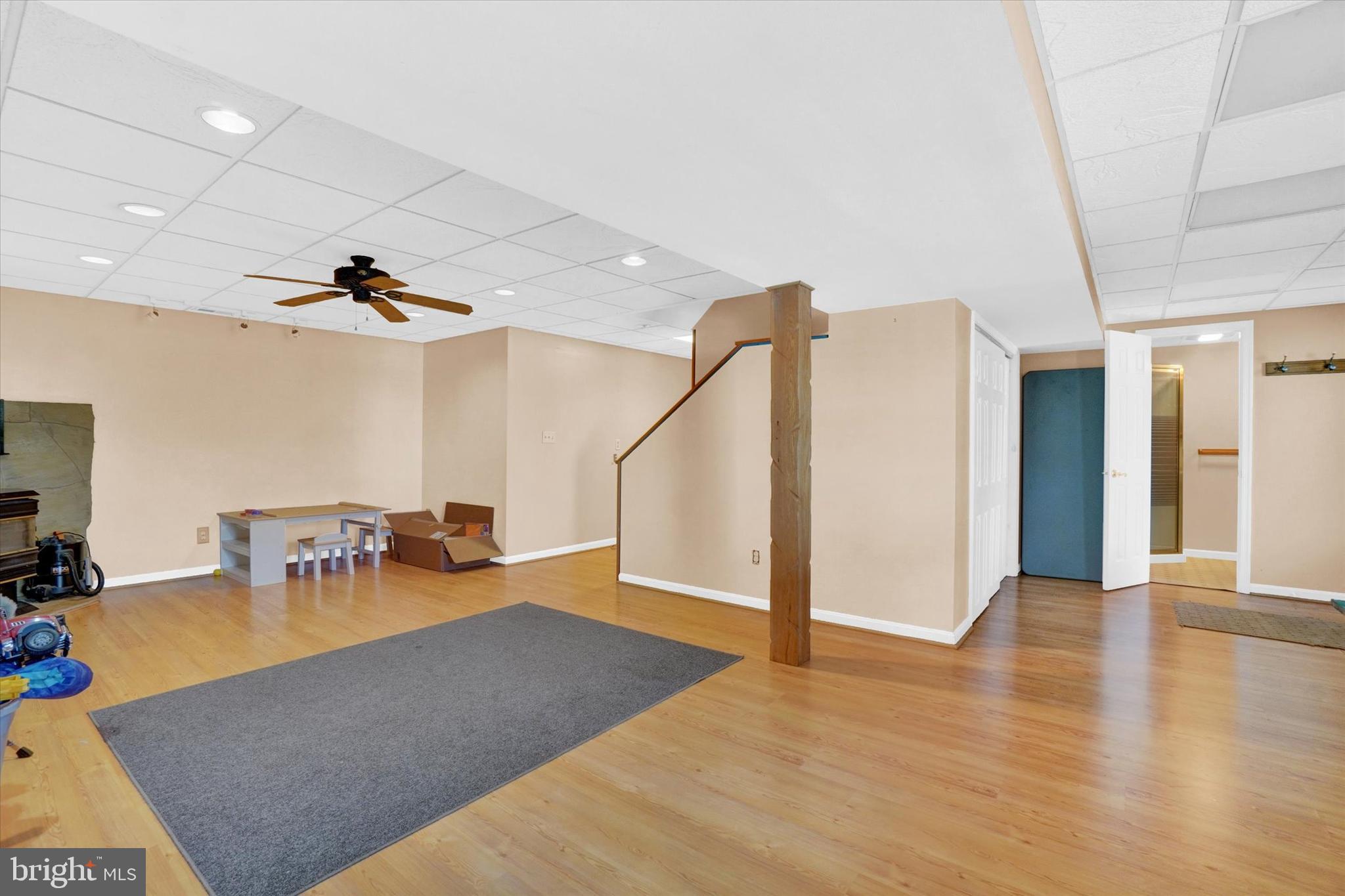 243 Bald Eagle Road Fawn Grove, PA 17321 - Photo 23 of 44 a view of a livingroom with furniture and a ceiling fan