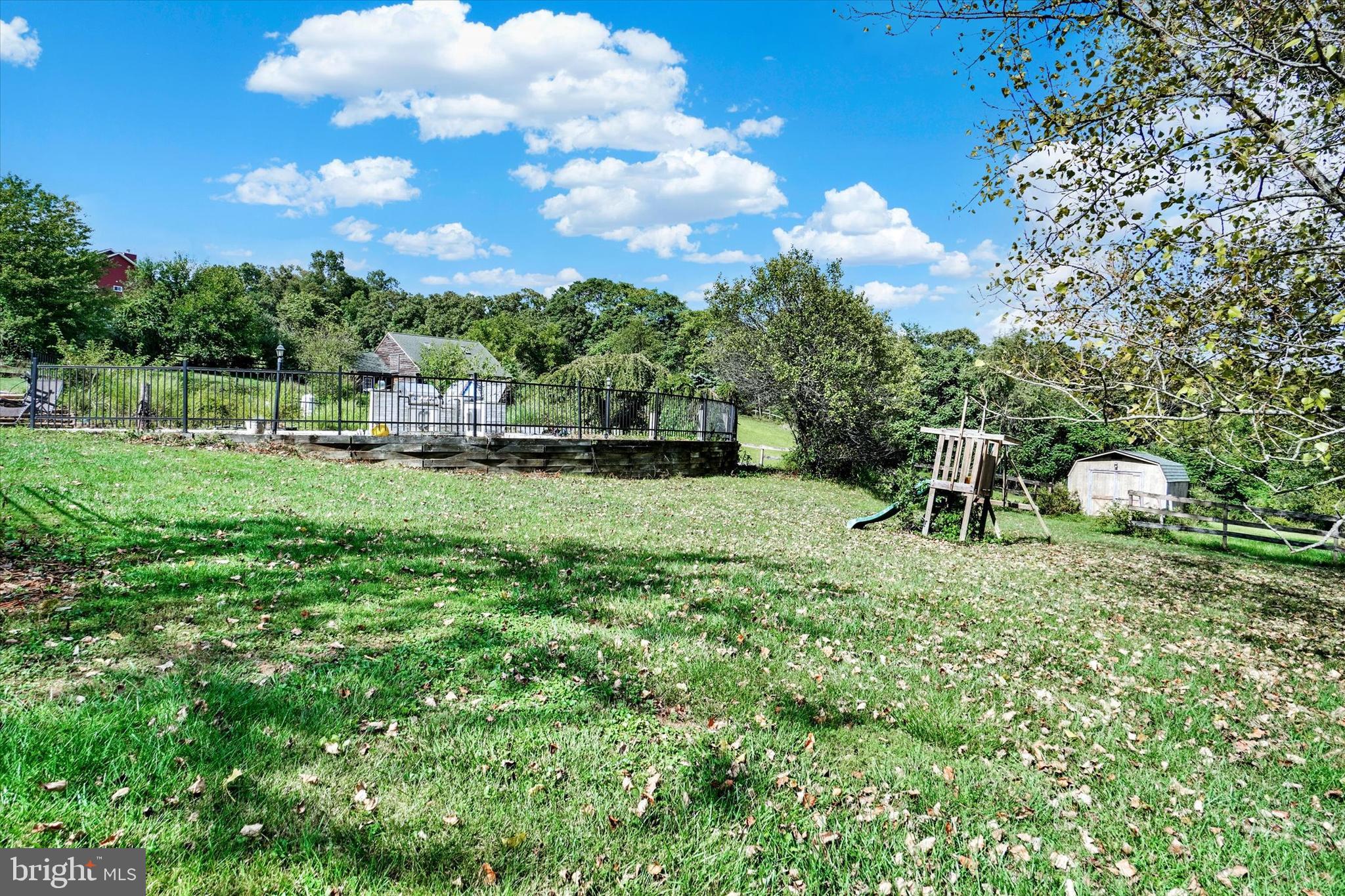 243 Bald Eagle Road Fawn Grove, PA 17321 - Photo 38 of 44 a backyard of a house with table and chairs