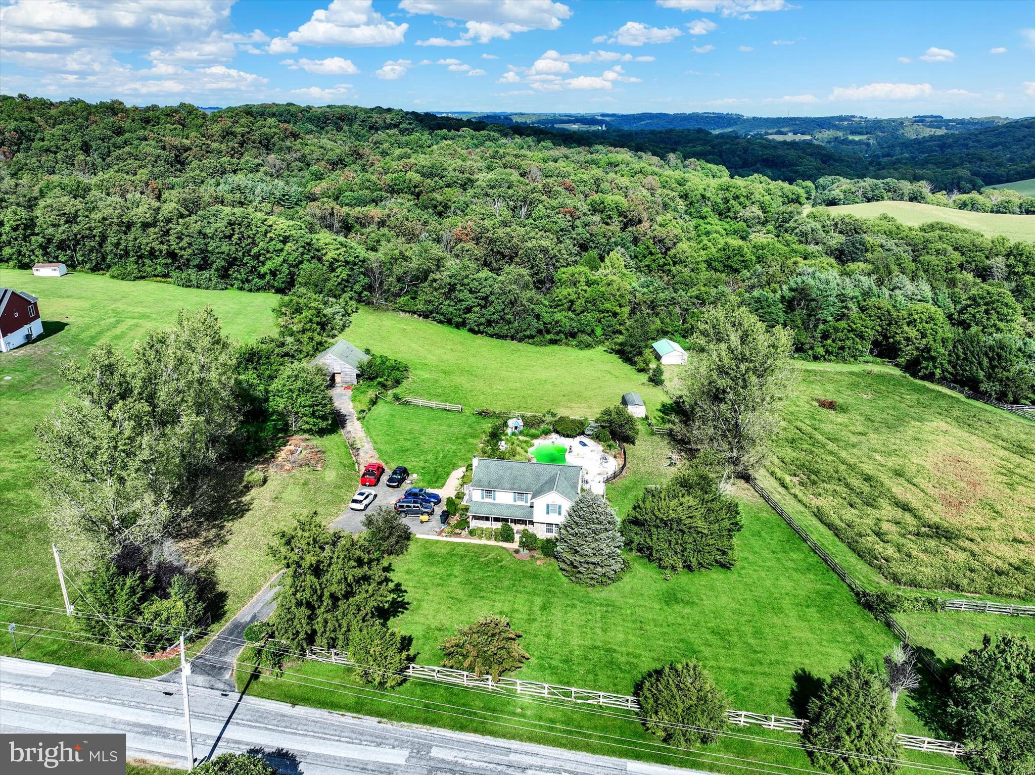 243 Bald Eagle Road Fawn Grove, PA 17321 - Photo 39 of 44 a view of a garden with a building in the background