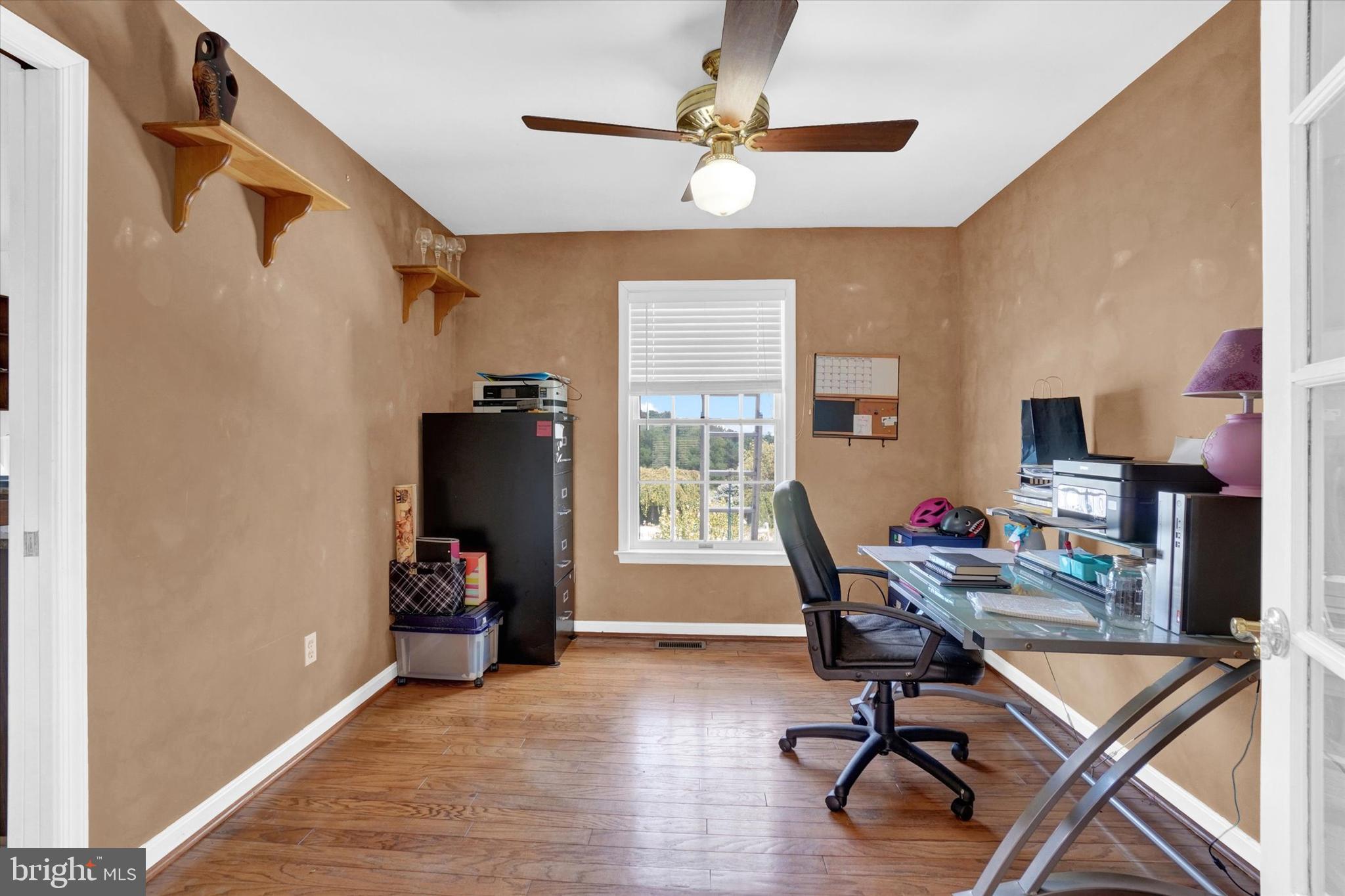243 Bald Eagle Road Fawn Grove, PA 17321 - Photo 6 of 44 a view of a workspace with furniture and a window