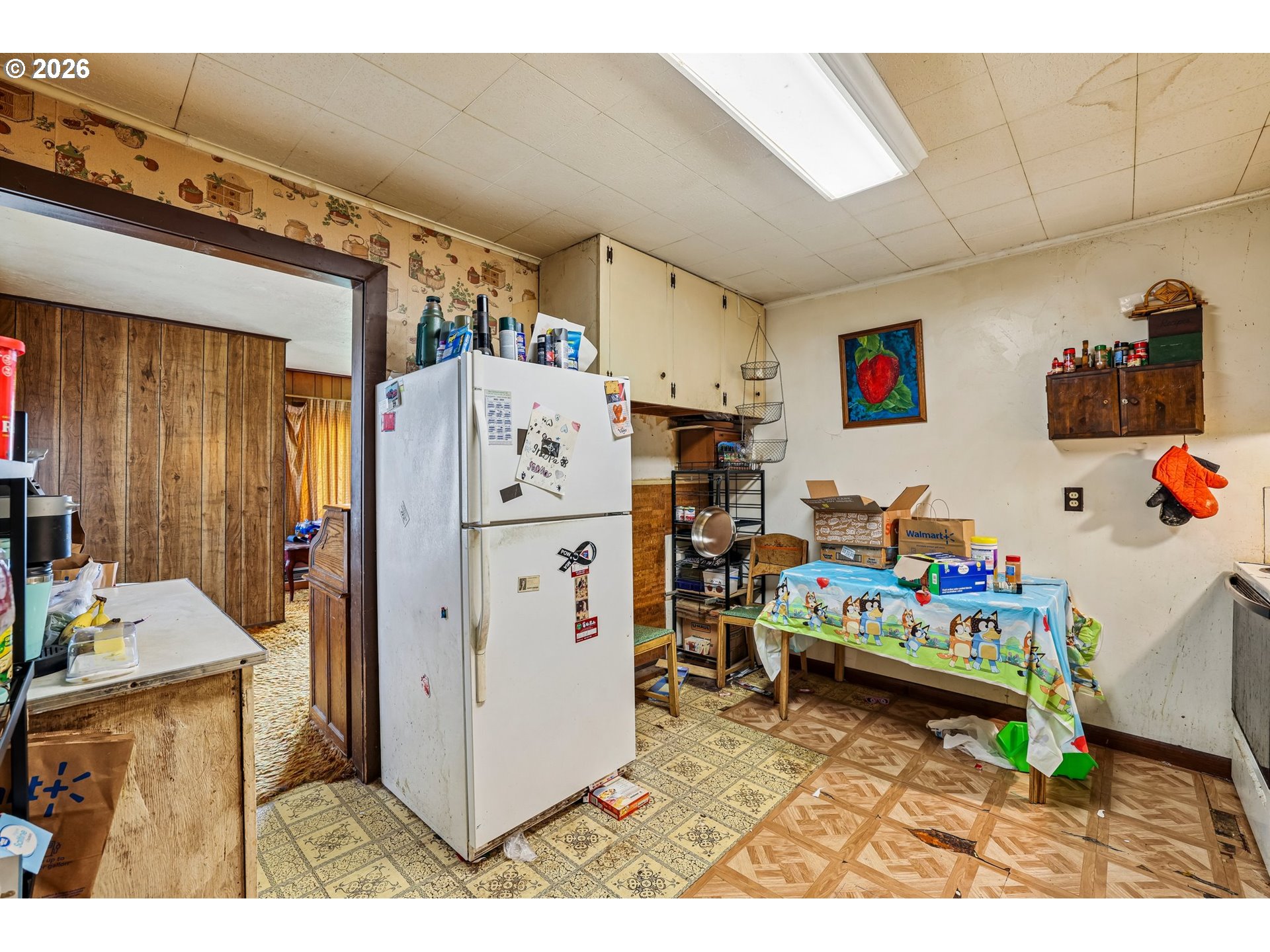 226 Mize Road Southeast Salem, OR 97302 - Photo 14 of 27 a storage utility room with a refrigerator and a stove