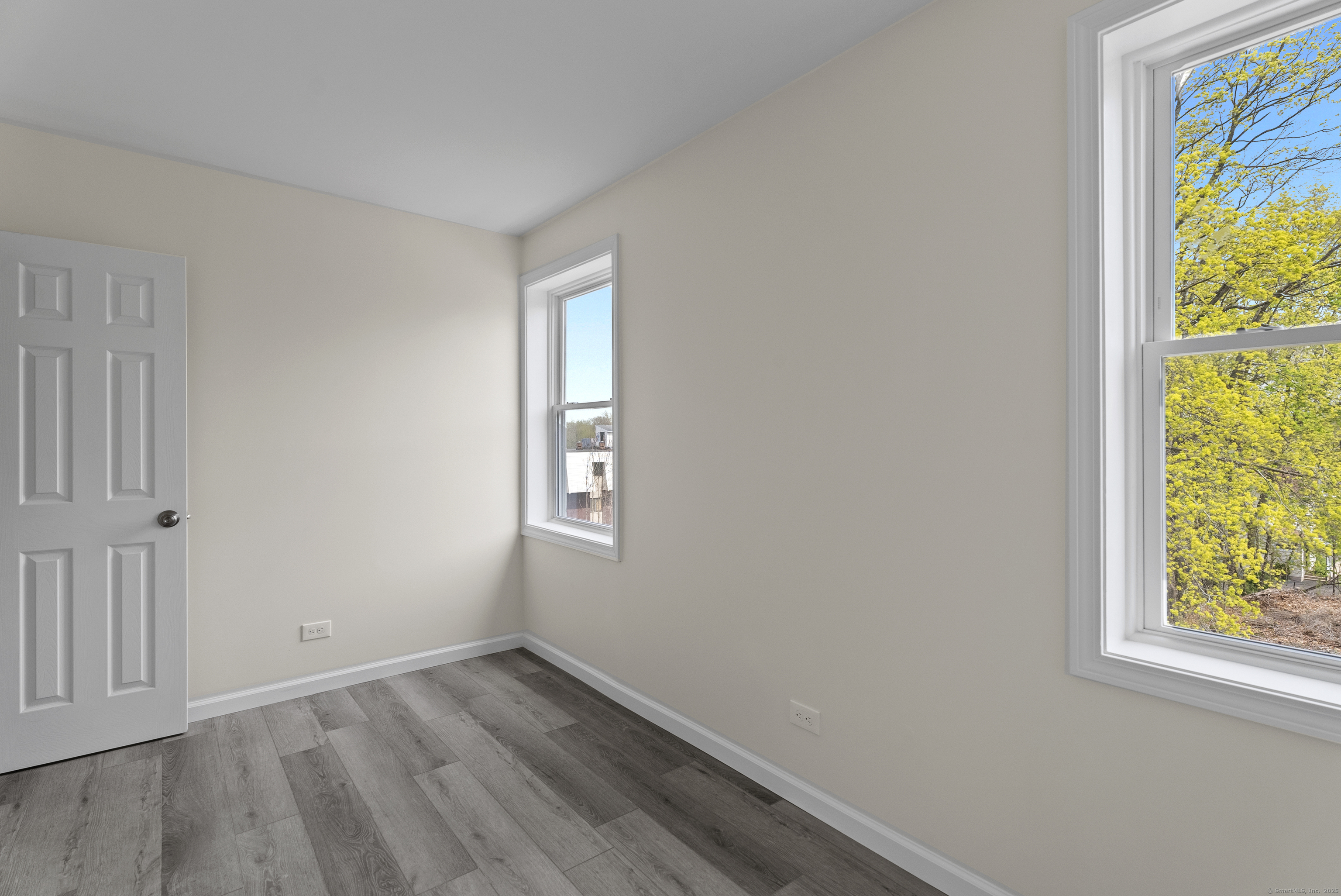 72 South Main Street, Unit 2C Wallingford, CT 06492 - Photo 5 of 10 a view of an empty room and window