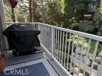 a view of balcony with a potted plant