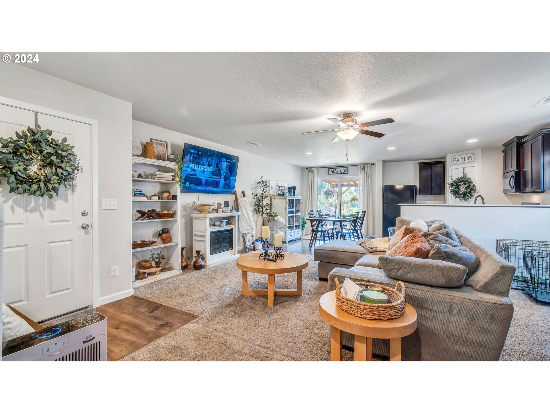 330 Forest Lane Molalla, OR 97038 - Photo 14 of 29 a living room with furniture and a chandelier