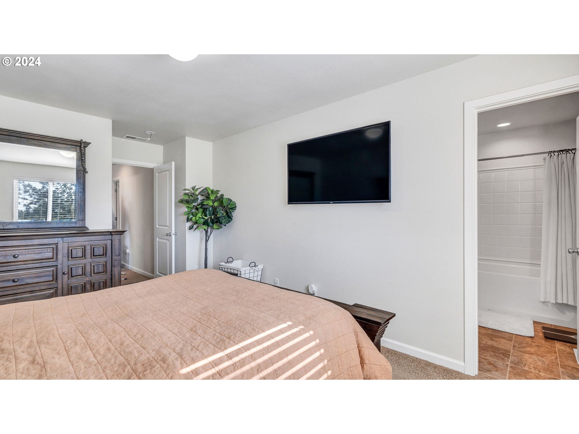 330 Forest Lane Molalla, OR 97038 - Photo 18 of 29 a bedroom with a bed and a flat screen tv