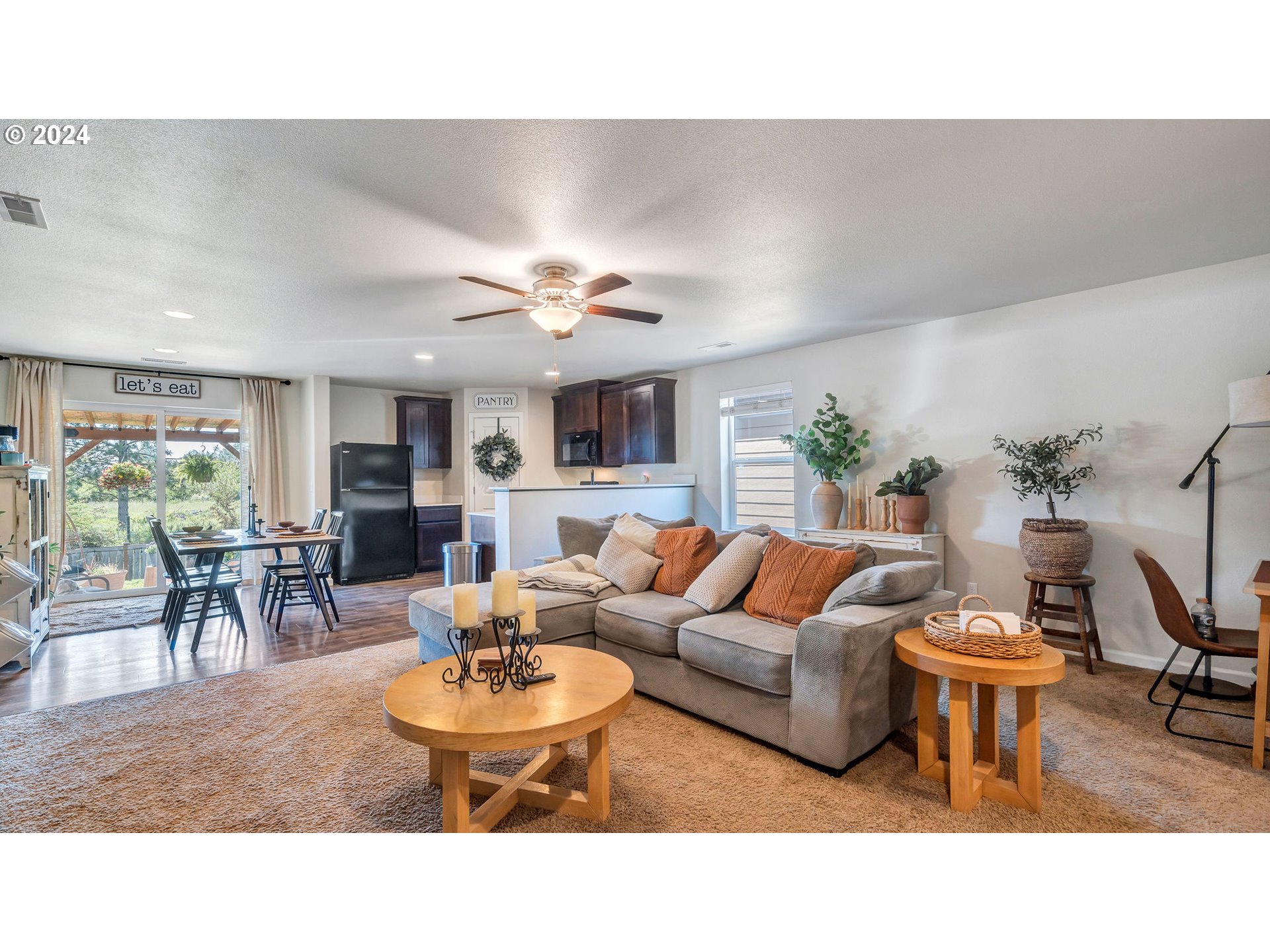 330 Forest Lane Molalla, OR 97038 - Photo 9 of 29 a living room with furniture and a dining table