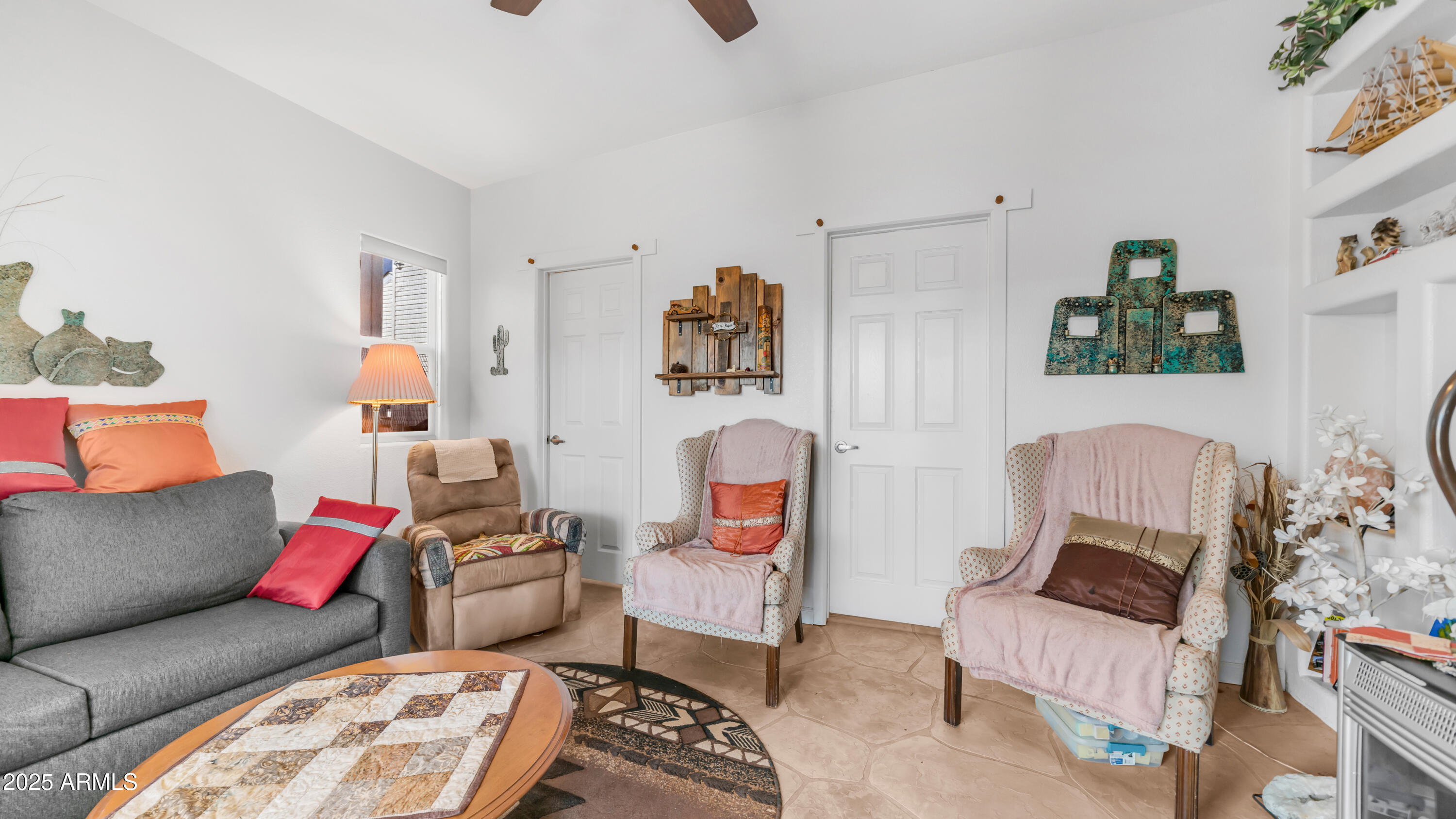 900 South Idaho Road, Unit 1106 Apache Junction, AZ 85119 - Photo 20 of 60 a living room with furniture and a couch