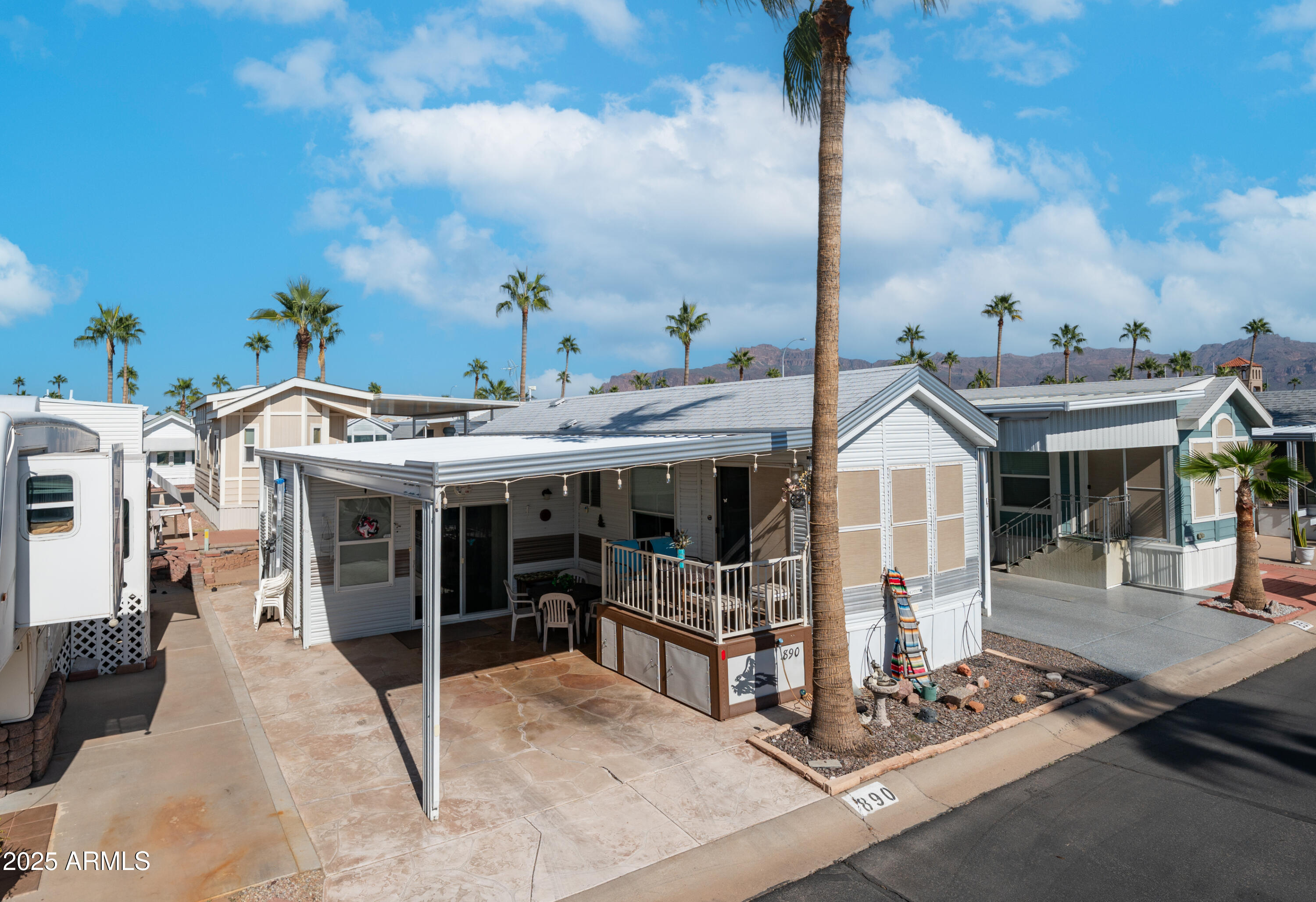 900 South Idaho Road, Unit 1106 Apache Junction, AZ 85119 - Photo 2 of 60 a view of a building with sitting area