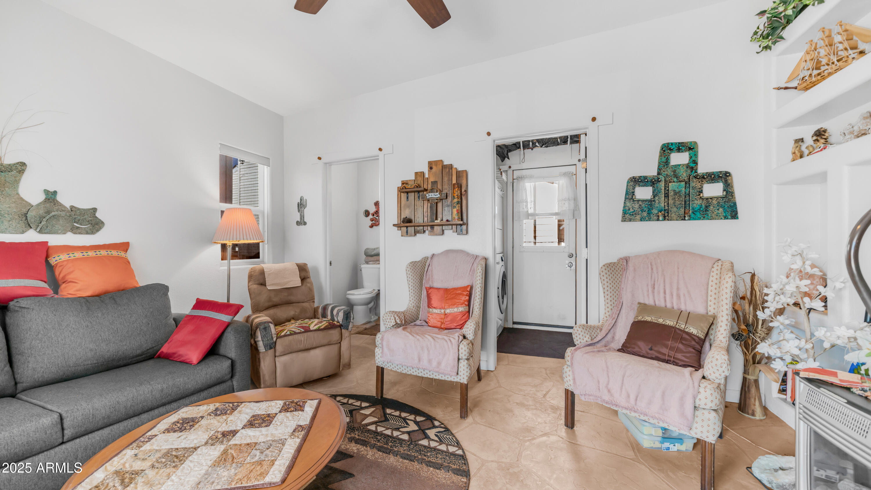 900 South Idaho Road, Unit 1106 Apache Junction, AZ 85119 - Photo 21 of 60 a living room with furniture and a couch