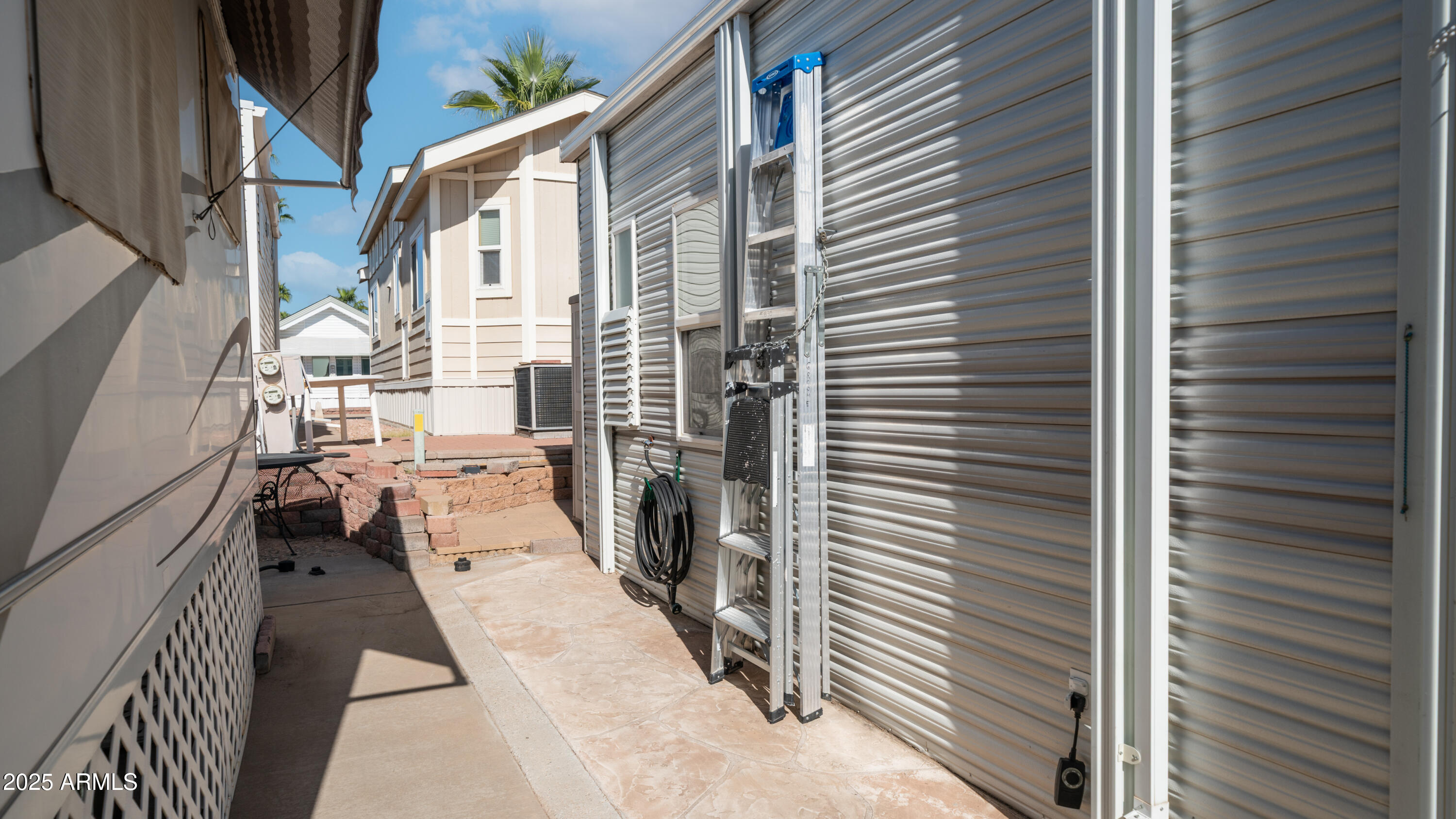 900 South Idaho Road, Unit 1106 Apache Junction, AZ 85119 - Photo 27 of 60 a balcony view with a outdoor seating space