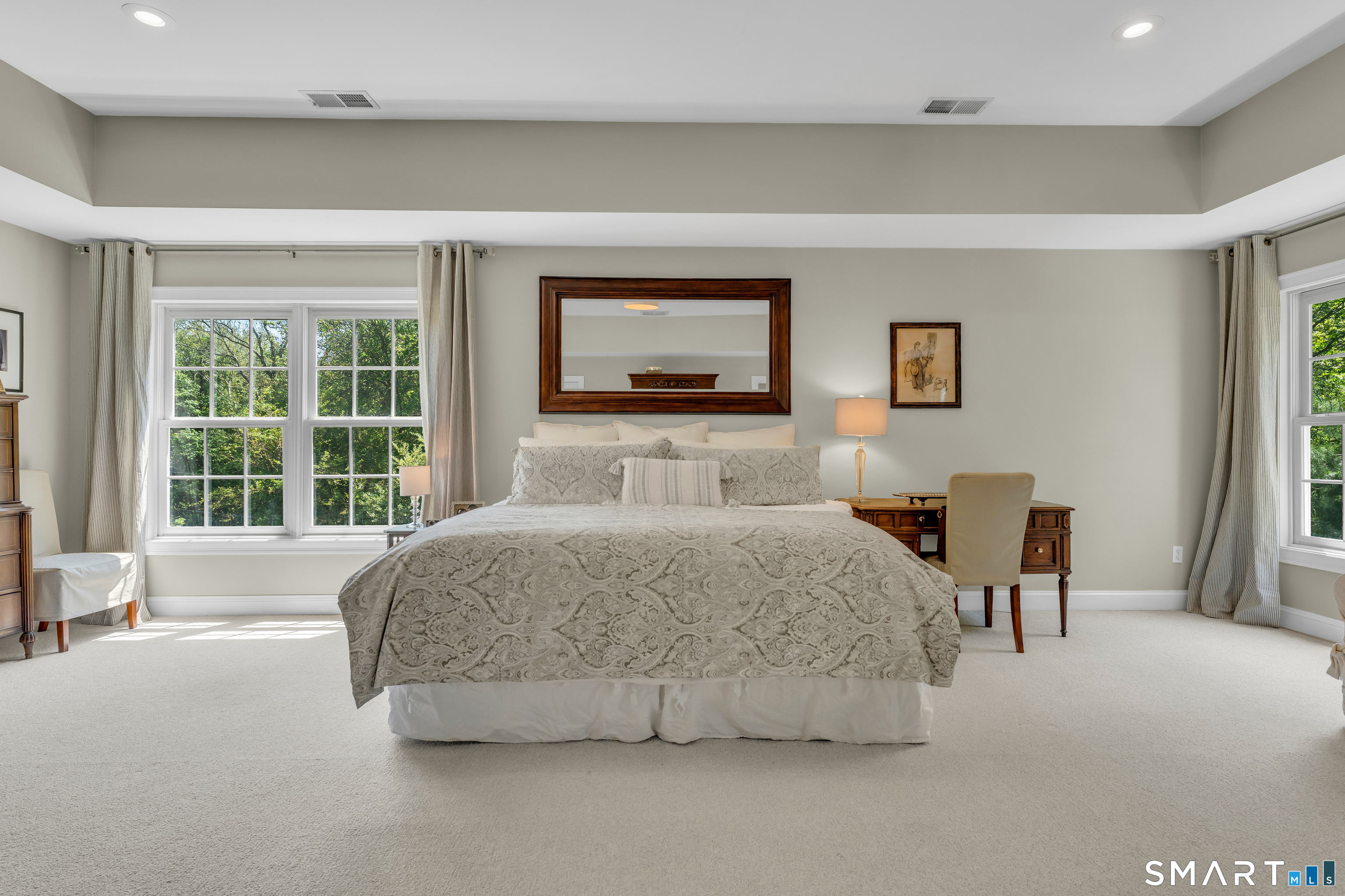 474 State Street Guilford, CT 06437 - Photo 21 of 40 a bedroom with a bed and a couch
