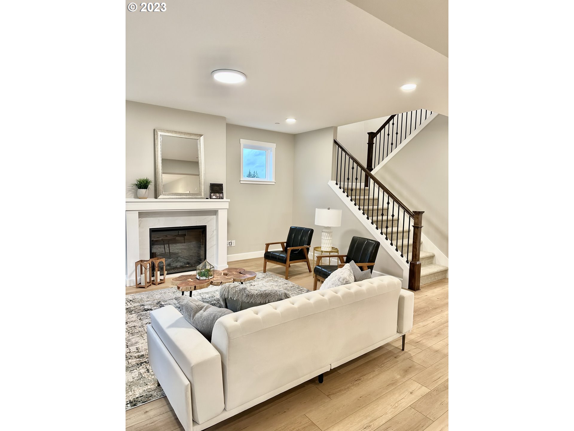 290 West Laurel Street Washougal, WA 98671 - Photo 11 of 20 a living room with furniture and a fireplace