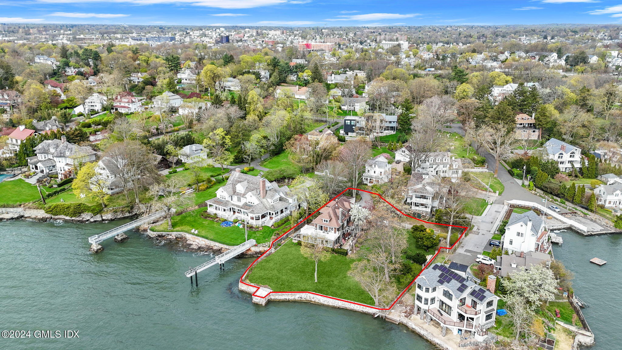 33 Byram Shore Road Greenwich, CT 06830 - Photo 11 of 16 an aerial view of a house with a yard