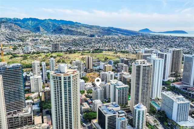 a view of city with ocean
