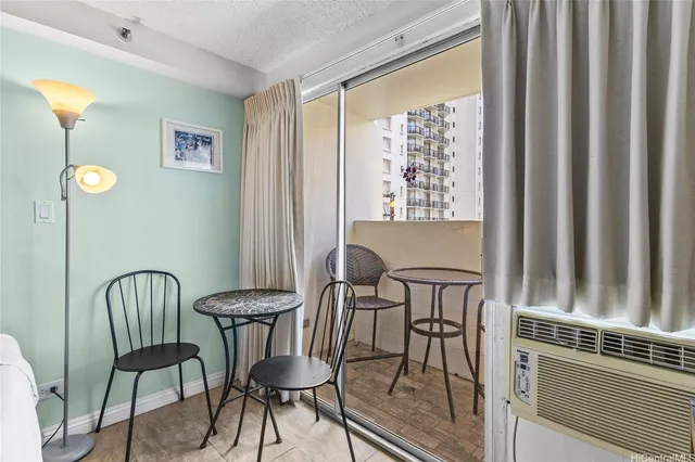 a view of a dining room with furniture window and outside view