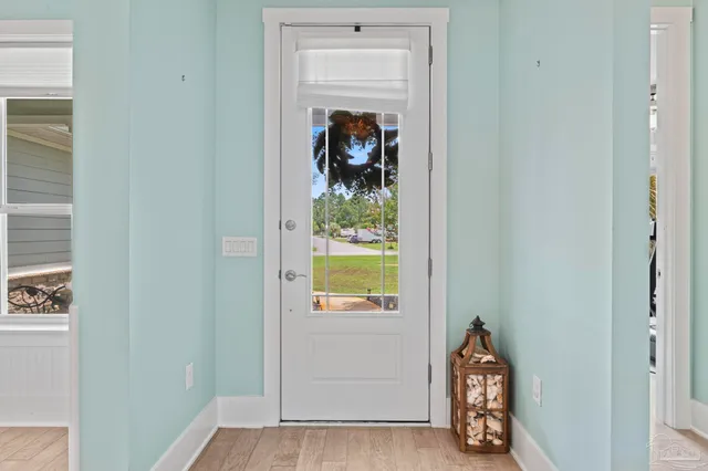 a living room with furniture fireplace and flat screen tv
